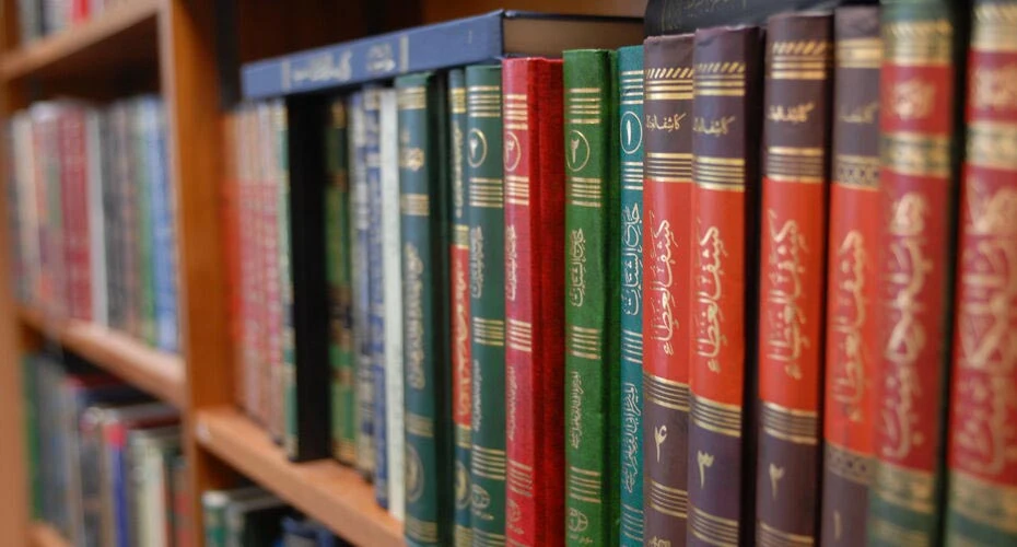 Closeup of IAIS books on a library bookshelf